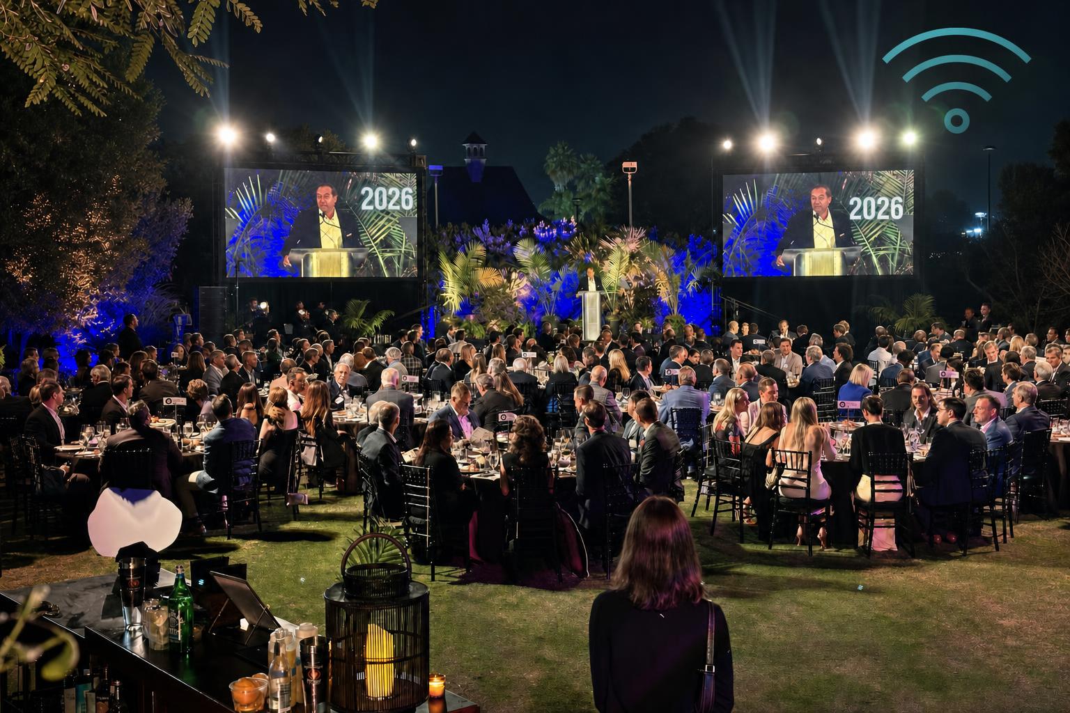 Attendees networking at a corporate gala with private LTE coverage across the full venue